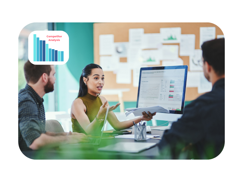 A group of young professionals engaged in a data-driven discussion around a computer screen displaying analytics, with a "Competitor Analysis" chart in the background, highlighting strategic thinking in marketing apprenticeships.